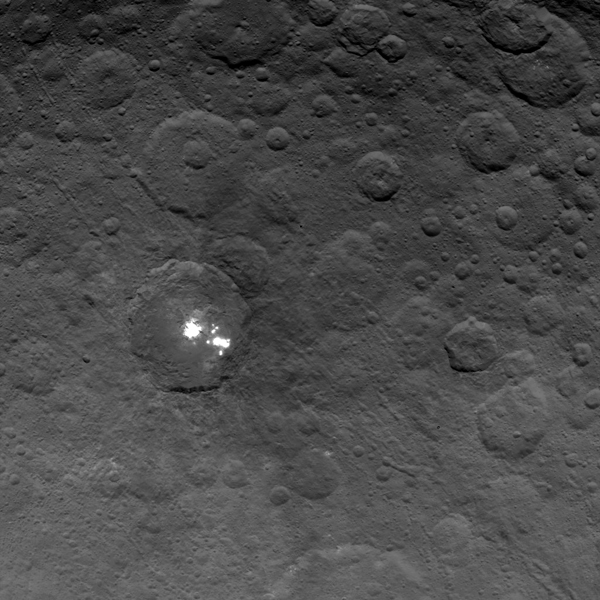 Bright spots on dwarf planet Ceres.  Image courtesy of NASA/JPL-Caltech/UCLA/MPS/DLR/IDA.