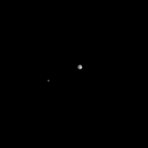 Week-long time-lapse pictures of Pluto and Charon taken from 100 million kilometers away by New Horizons.  Image courtesy of NASA/Johns Hopkins University Applied Physics Laboratory/Southwest Research Institute. 